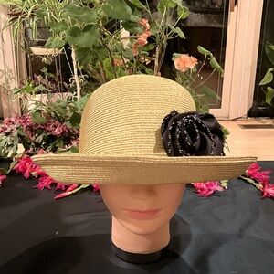 Elegant Metallic Gold Hat with Black Beaded Floral Accent